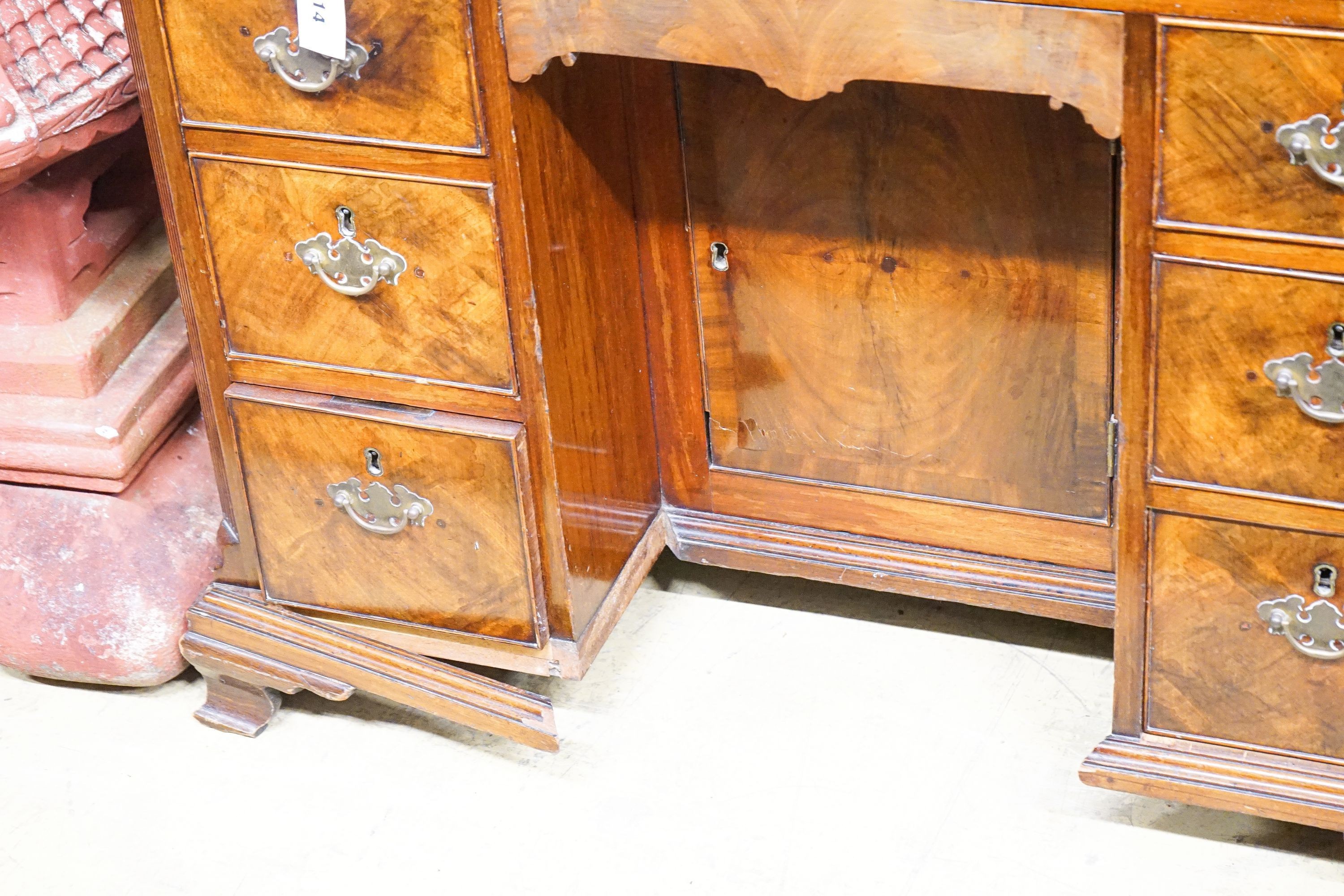 A George II style mahogany kneehole desk, length 92cm, depth 52cm, height 81cm